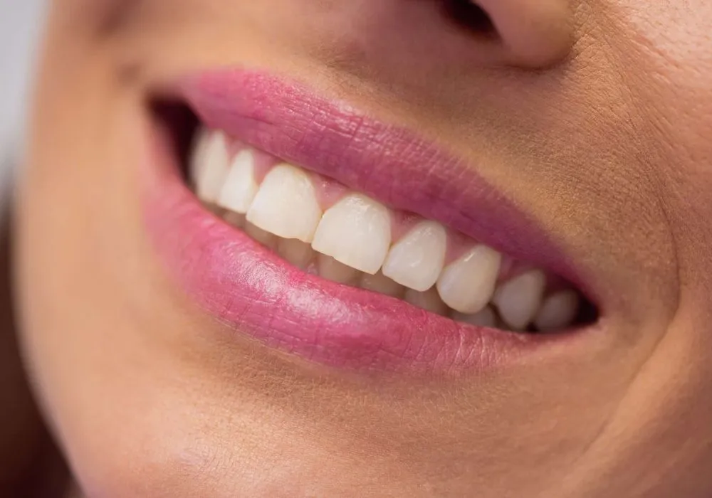 Close-up of female patient receiving a dental treatment at clinic